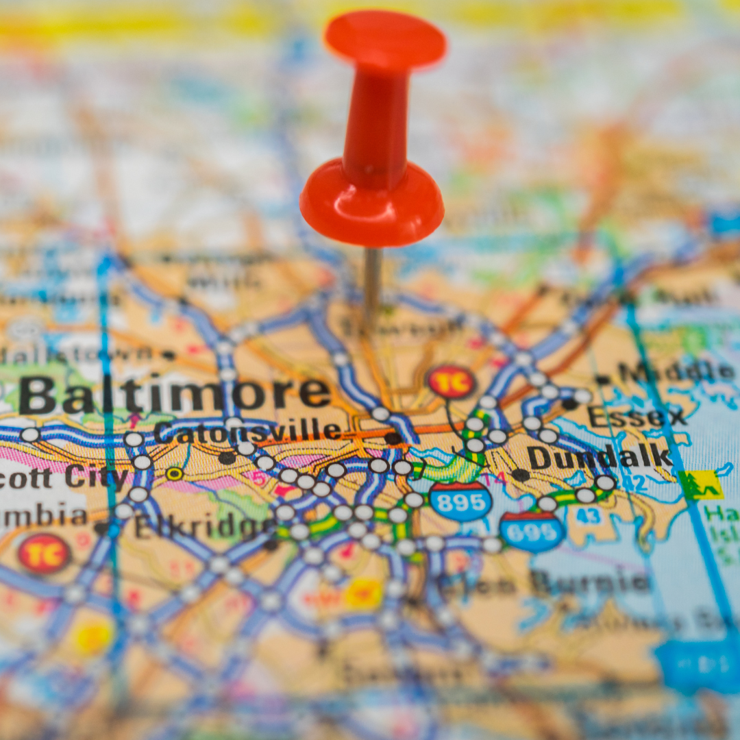 Close up map view of Maryland, showing major highways and towns Baltimore, Dundalk, and others. Map has a red pin in it.